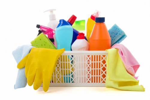 Professional oven cleaning service in a kitchen